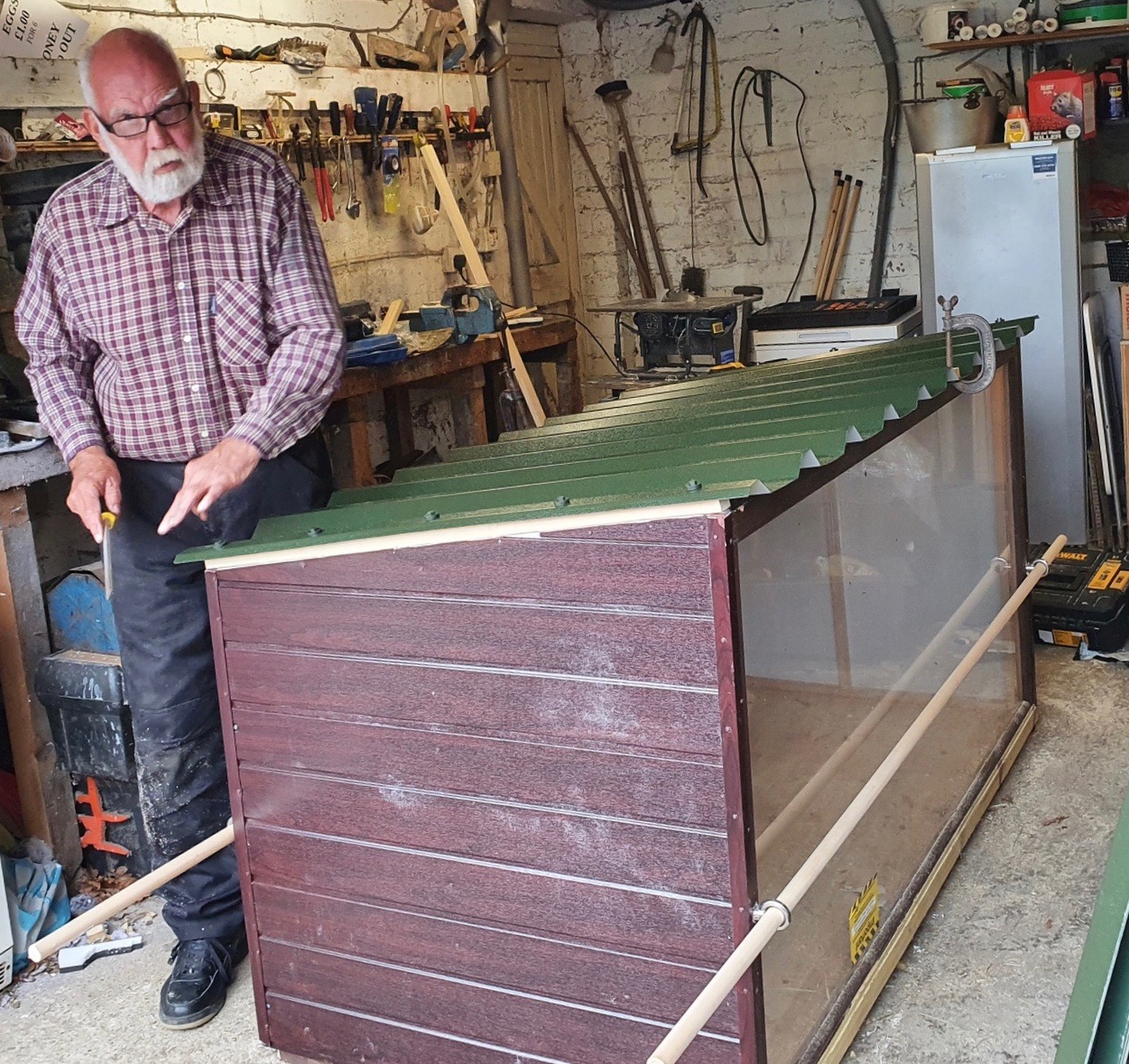 A small group of members began to refurbish the crib which is displayed at Christmas