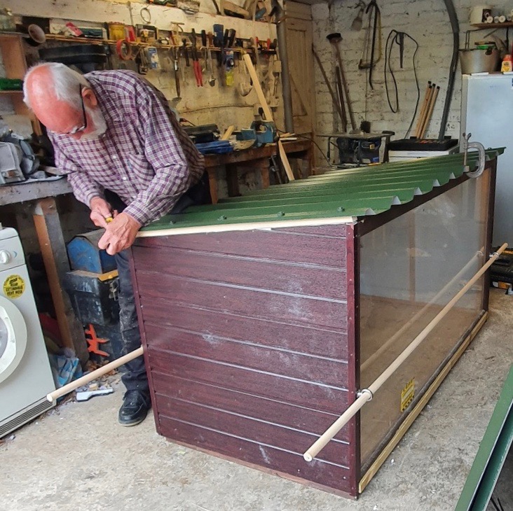 A small group of members began to refurbish the crib which is displayed at Christmas