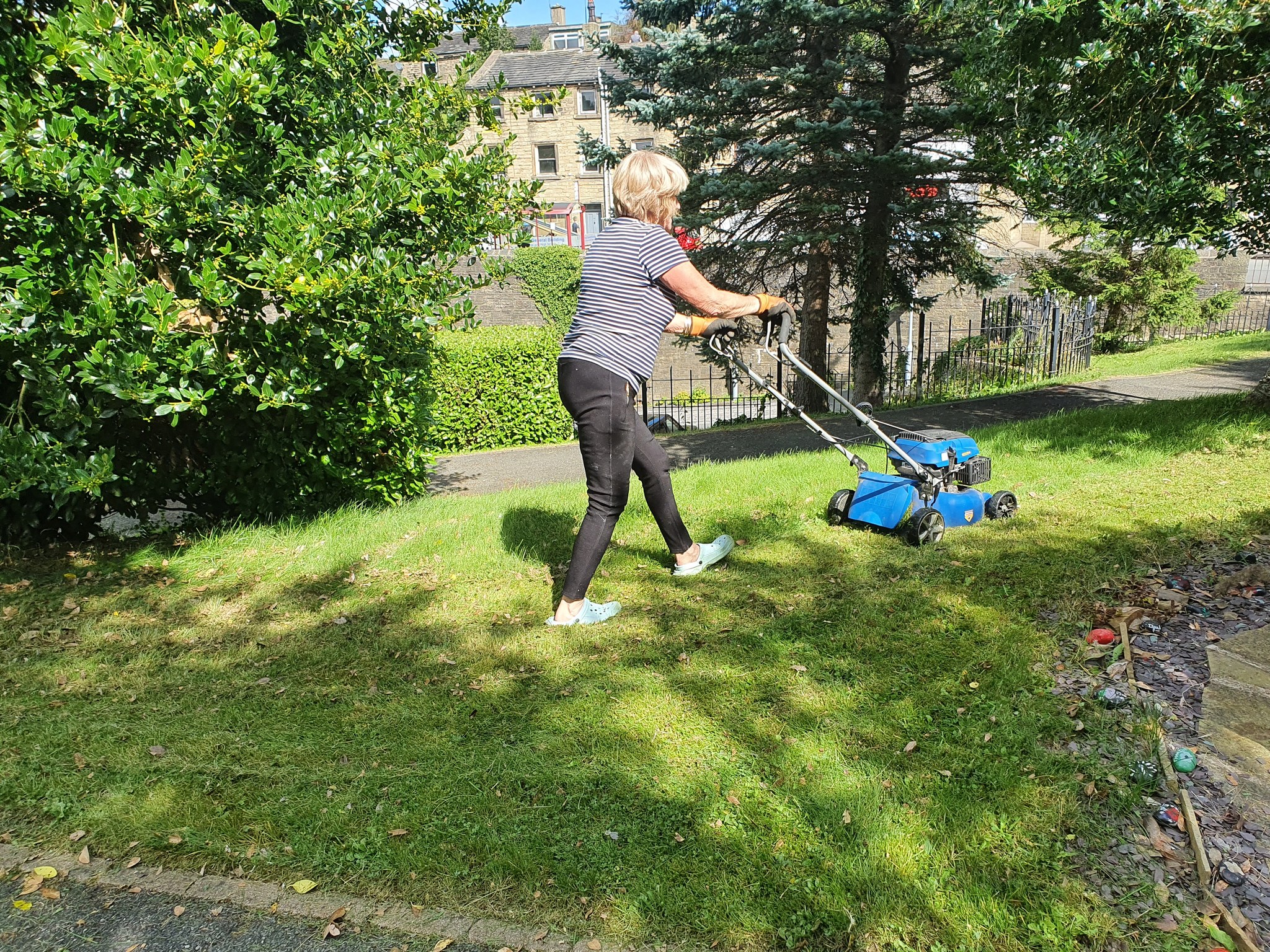 Mowing the lawn in the Memorial Garden