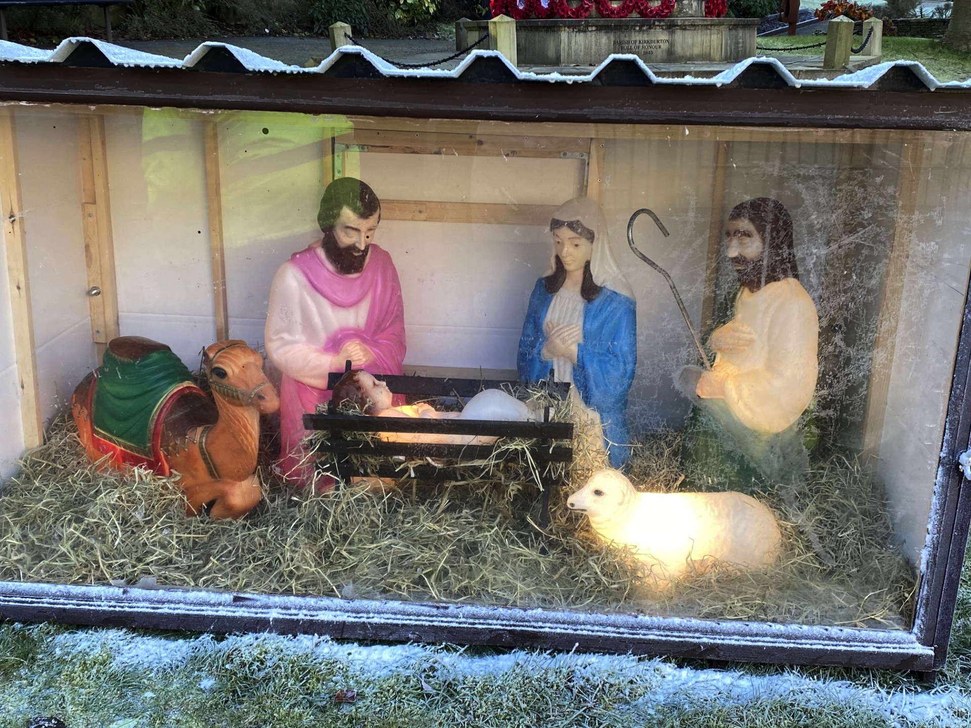 The crib display refurbished and lit up.
