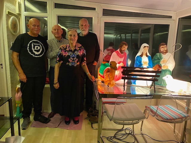 Volunteers showing off the refurbished light up crib characters