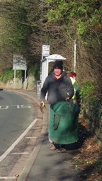 Volunteer clearing ivy along North Road