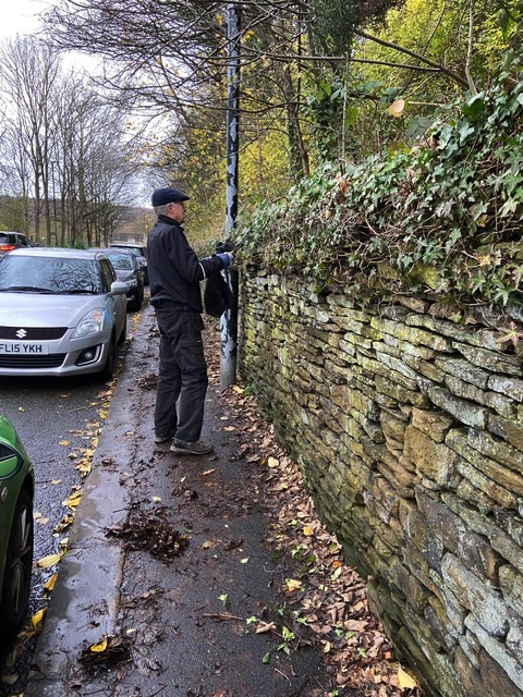 Volunteer clearing paths